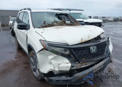 2019 Honda Passport Touring z USA, uszkodzony, nr VIN 5FNYF8H9XKB017556